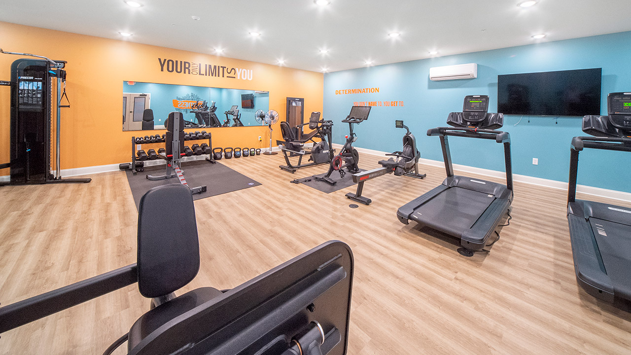 gym with treadmills and weights